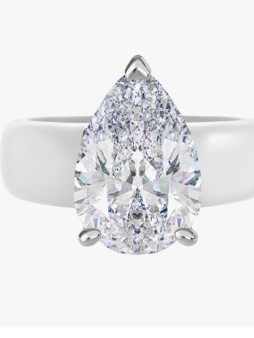 Pear-Cut White Solitaire Ring on Polished Silver Band